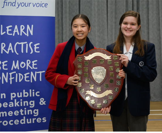 2024 and 2025 Junior winners holding the trophy